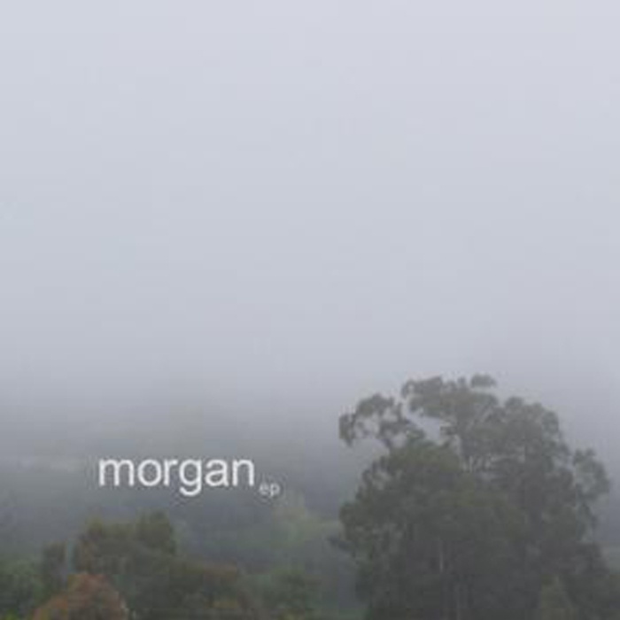 above the freeway_ a darkened hill